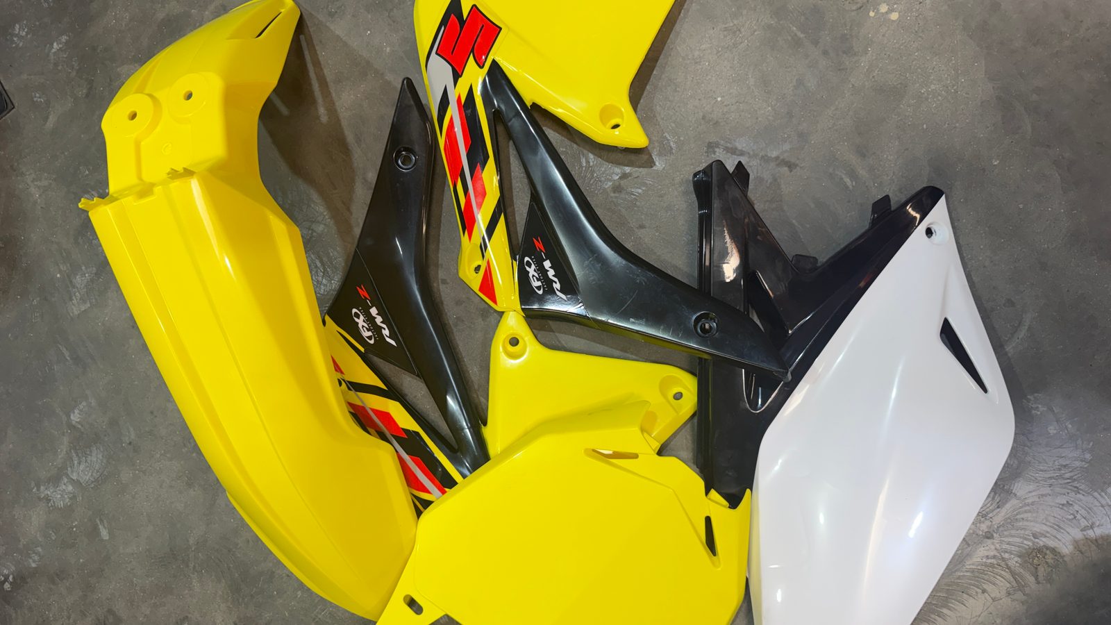 2012 Suzuki RMZ250 OEM Plastics Kit Front Fender Shrouds Side Number Plates