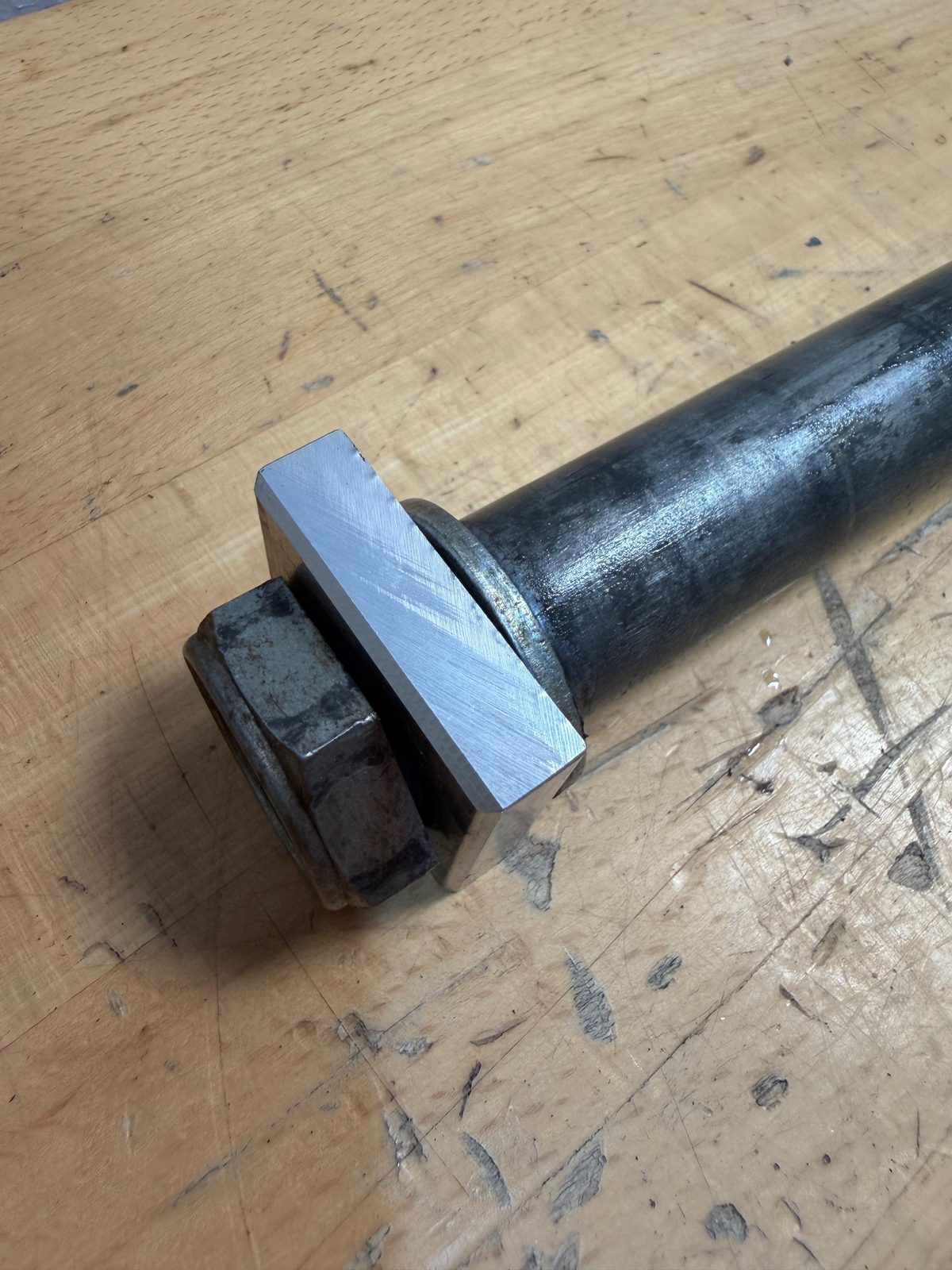 2025 Yamaha YZ250F OEM Rear Axle with Nut and Chain Adjuster Block - 90179-24004-00