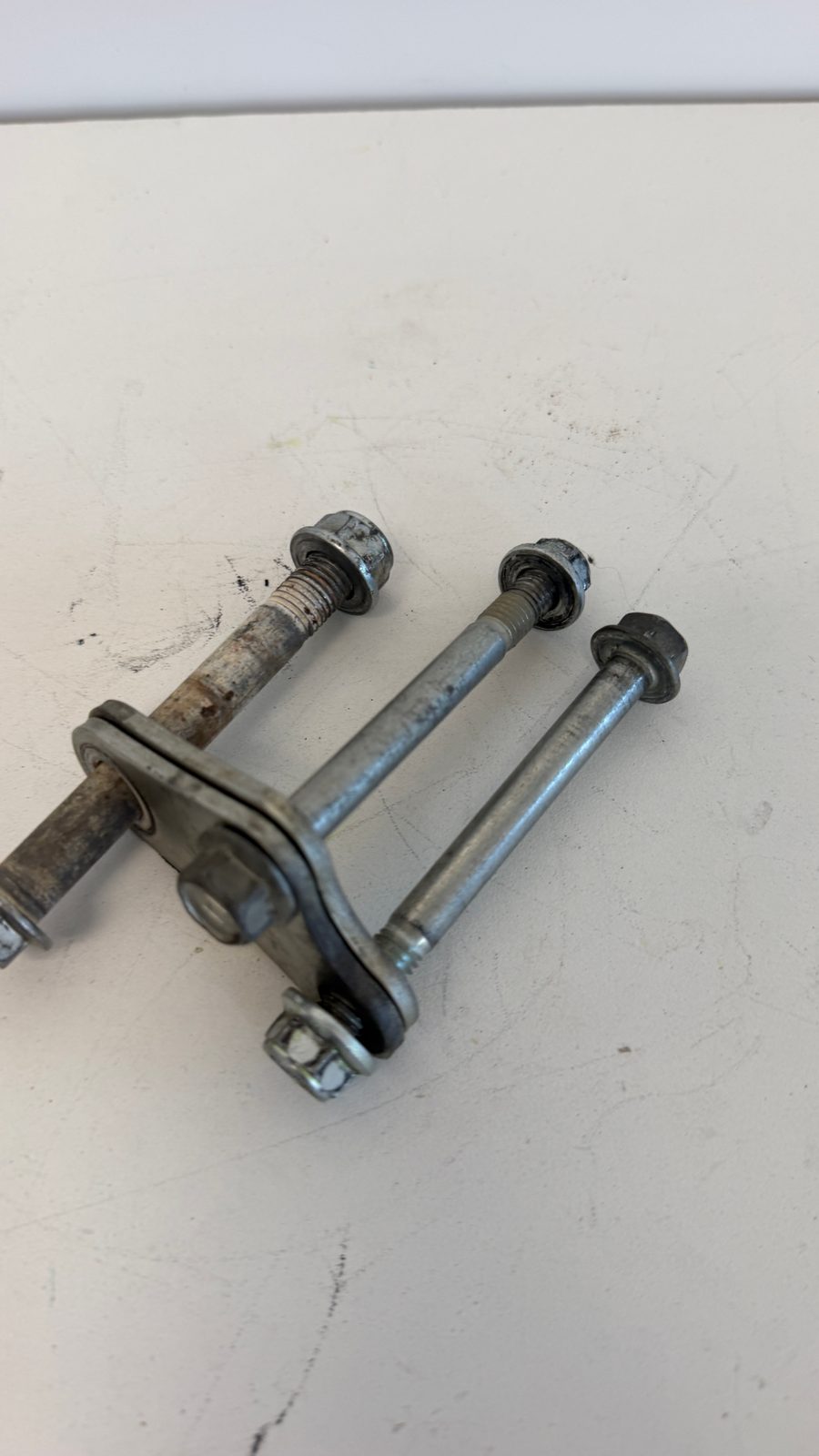 2012 Suzuki RMZ250 OEM Engine Mount Bolt and Bracket Complete Assembly