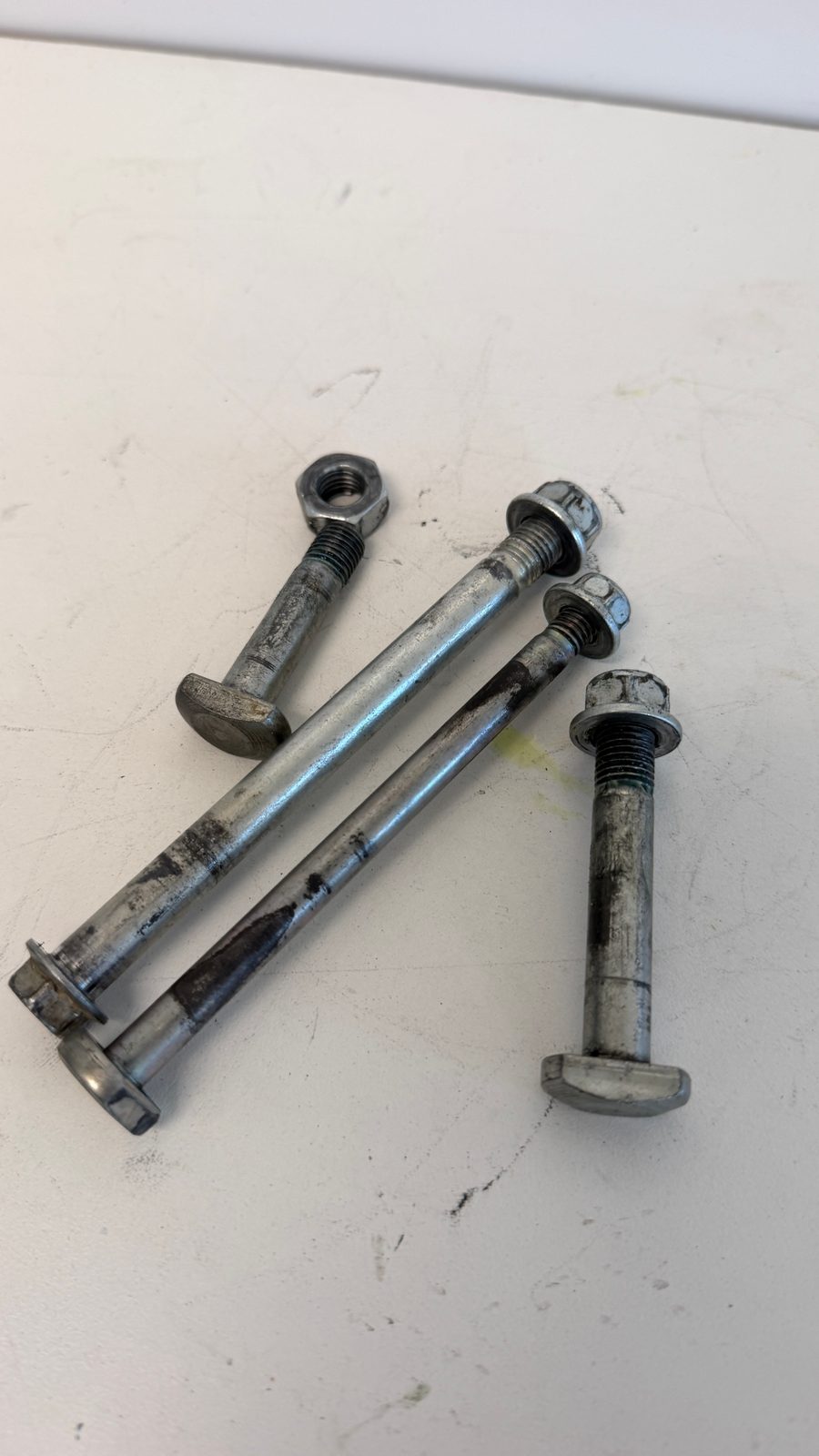 2012 Suzuki RMZ250 OEM Engine Mount Bolt and Bracket Complete Assembly
