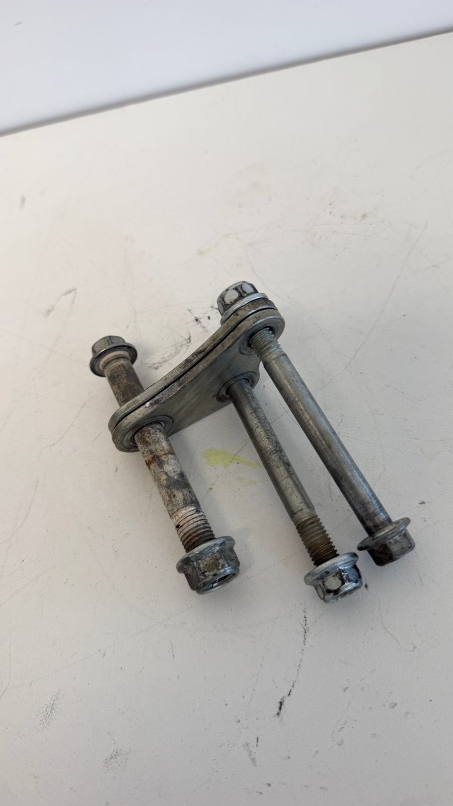 2012 Suzuki RMZ250 OEM Engine Mount Bolt and Bracket Complete Assembly