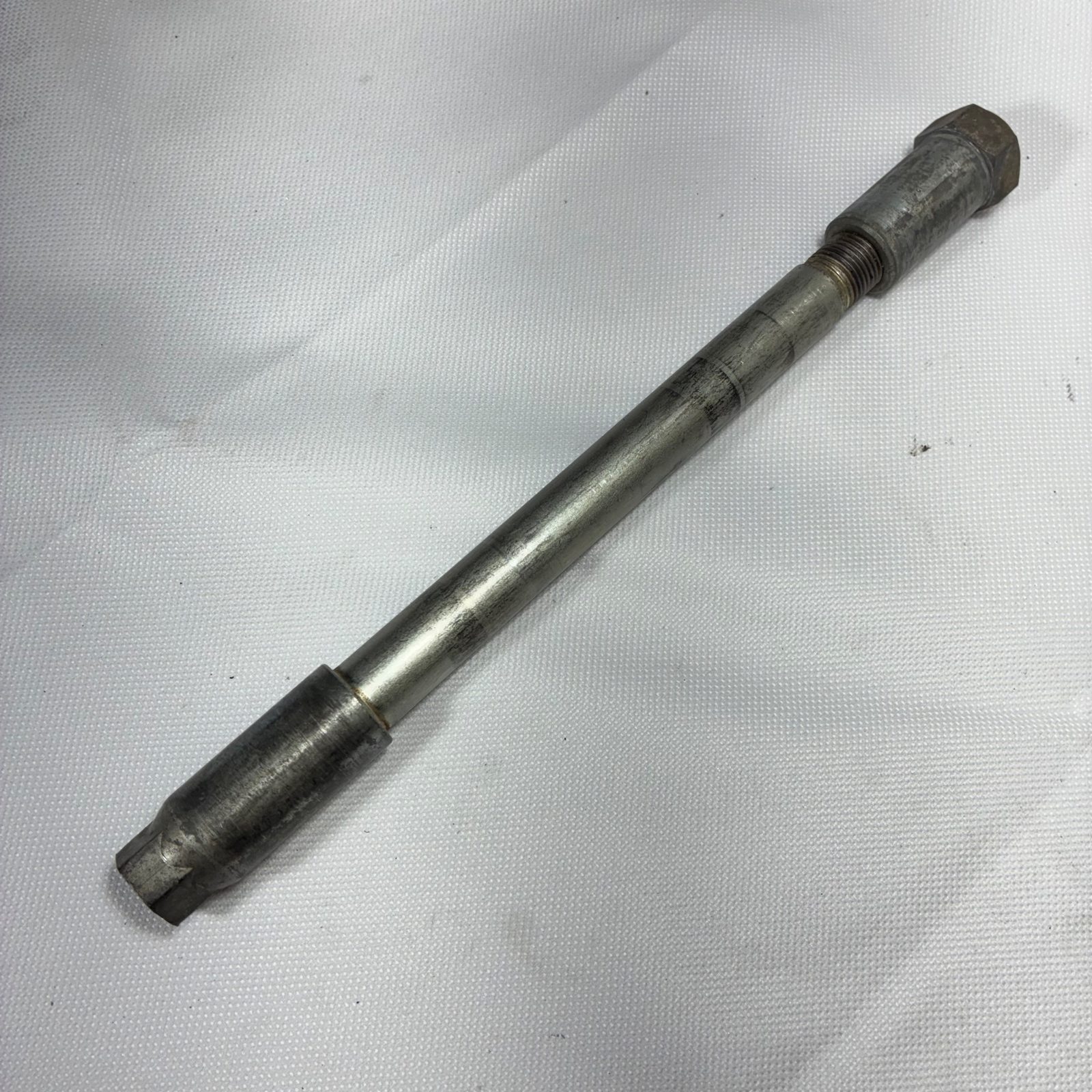 1990 Kawasaki KX125 OEM Front Wheel Axle Shaft Spindle - 33032-0006