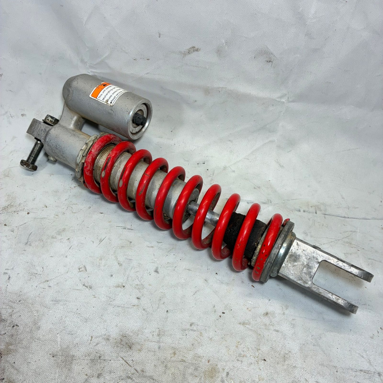 2003 Kawasaki KX65 OEM Rear Shock Absorber with Red Spring and Mount Bolt - 45014-0120-10