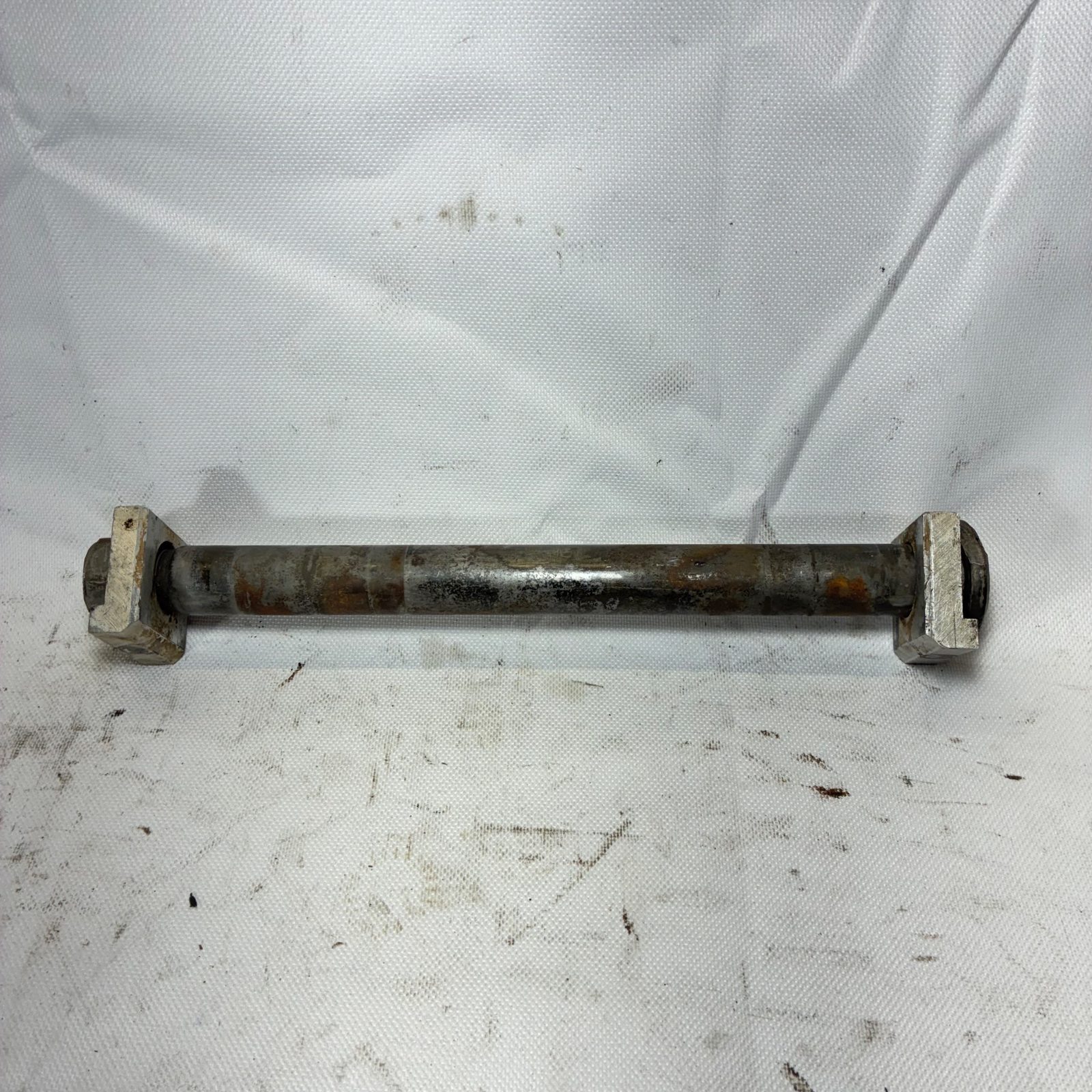 1999 Yamaha YZ250 OEM Rear Axle with Chain Adjuster Blocks and Nut - 5ET-25381-00-00