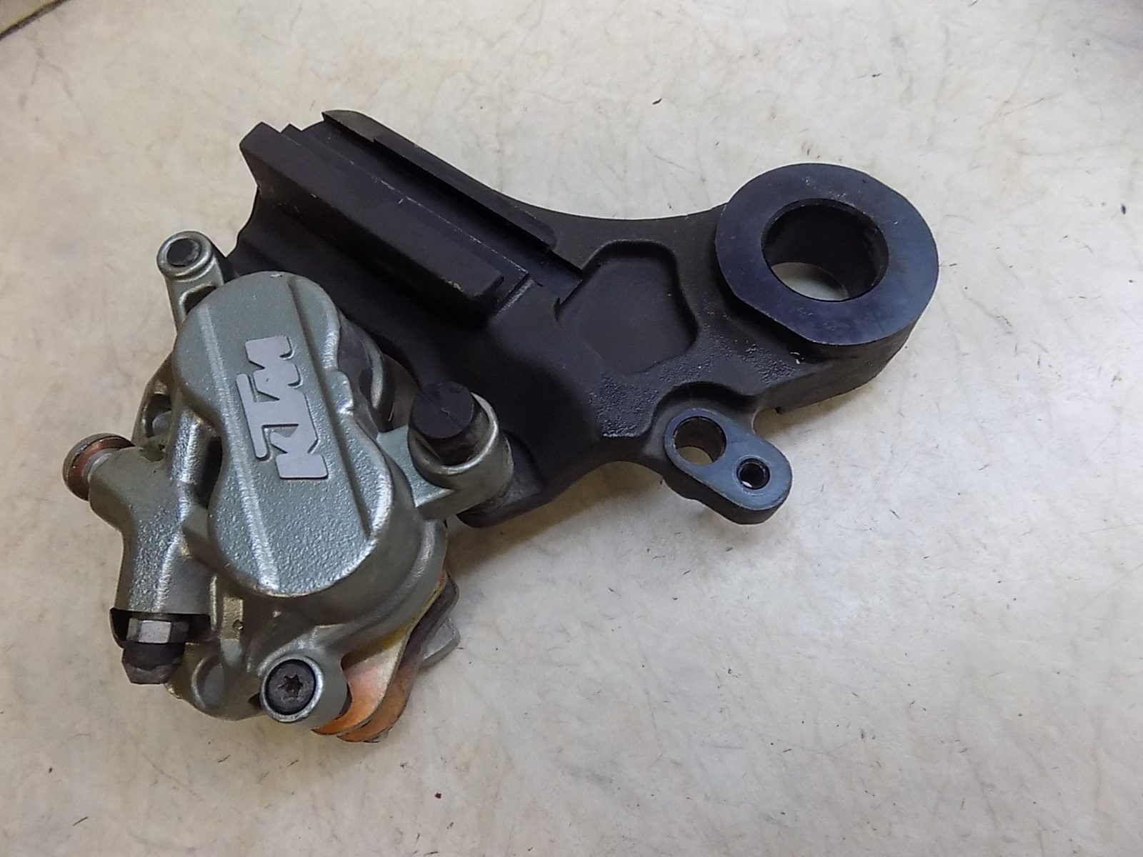 2019-2021 KTM 790 Adventure R OEM Rear Brake Caliper with Carrier Bracket