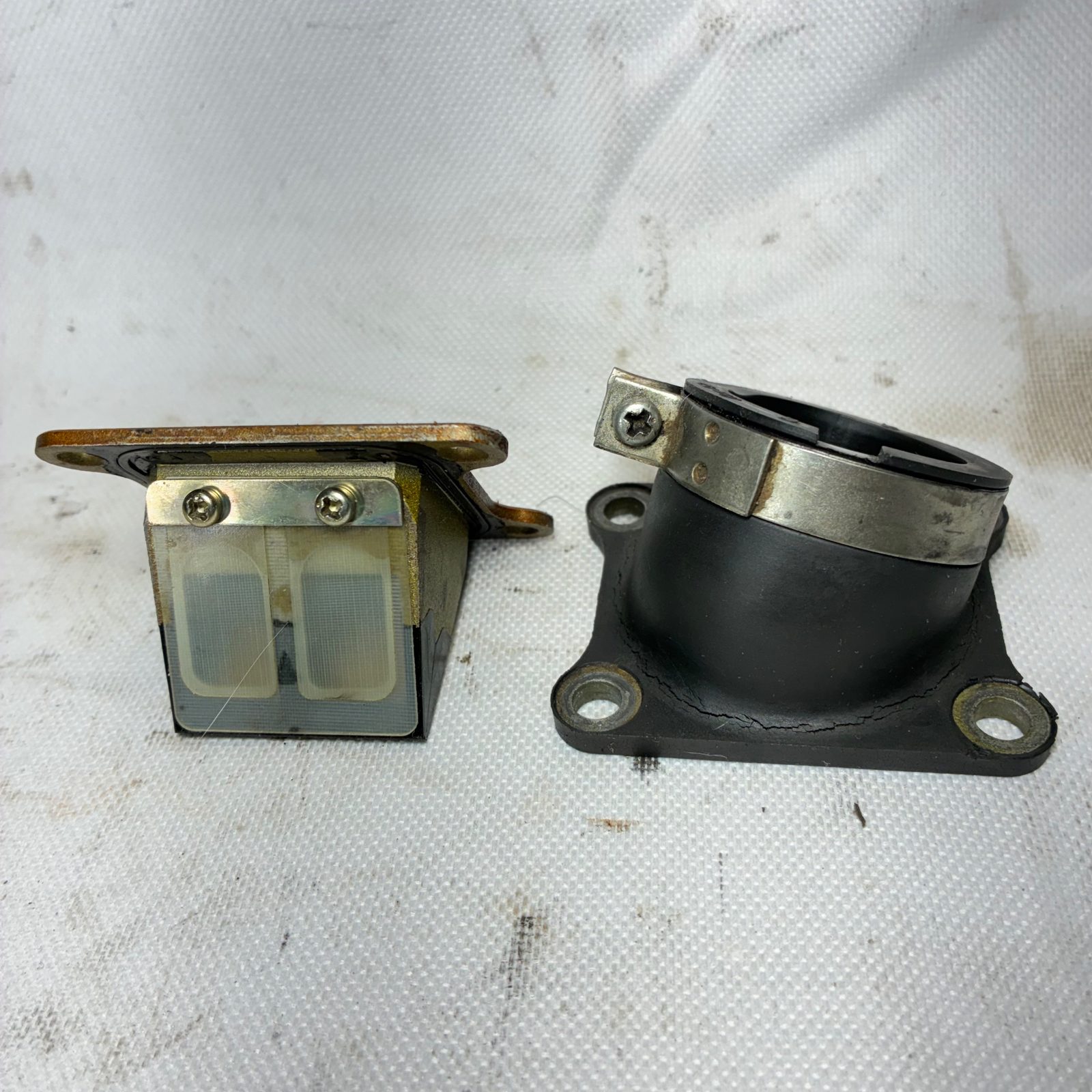 2003 Suzuki RM65 OEM Reed Valve Cage and Intake Boot Complete Assembly - K1202-11015