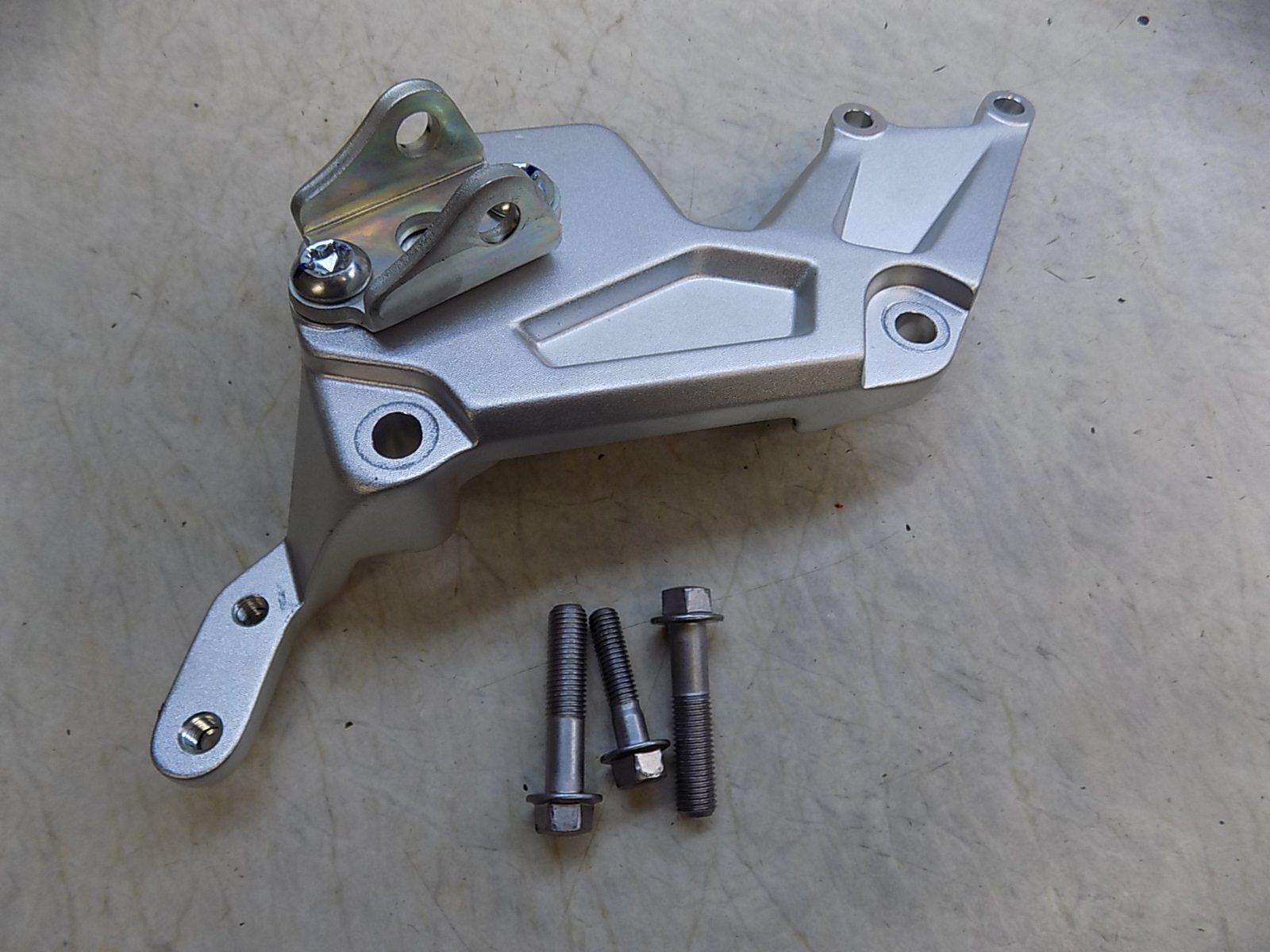 2026 Yamaha Tenere 700 OEM Left Rider Footpeg Bracket Mount with Bolts new