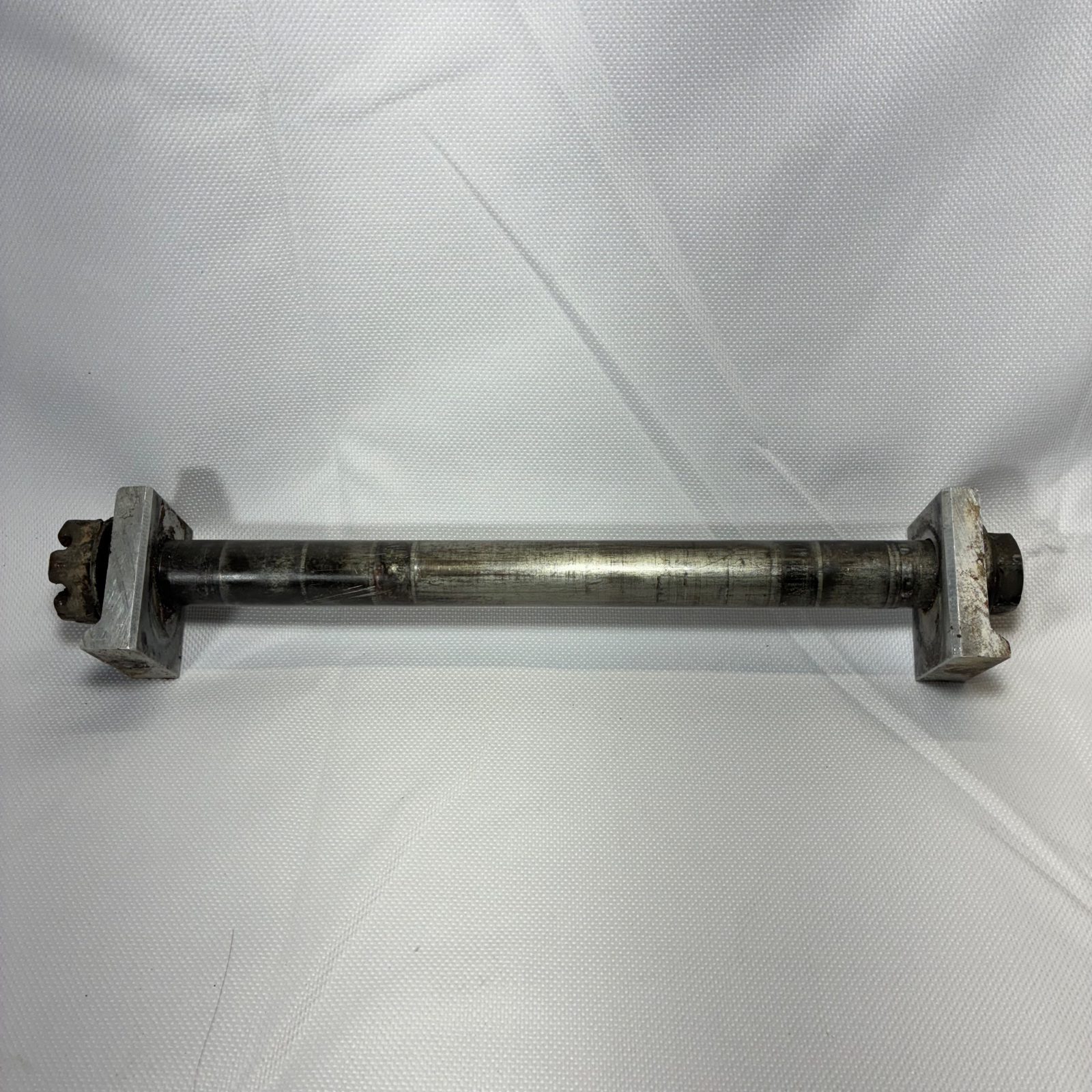1990 Kawasaki KX125 OEM Rear Axle with Chain Adjuster Blocks - 33032-0006
