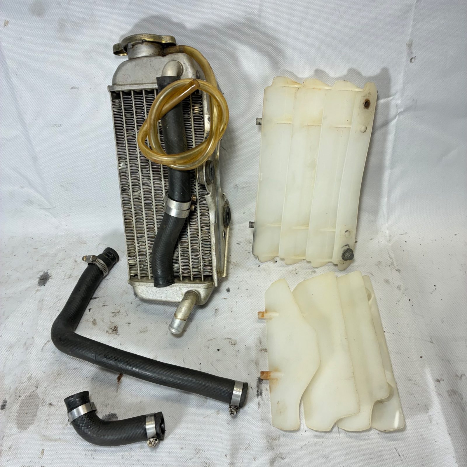 2003 Suzuki RM65 OEM Radiator with Hoses and Radiator Guards Complete Assembly